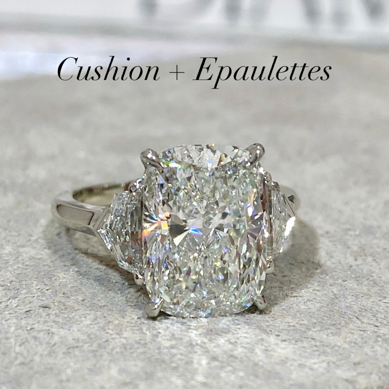 Cushion with Epaulette Three Stone Ring
