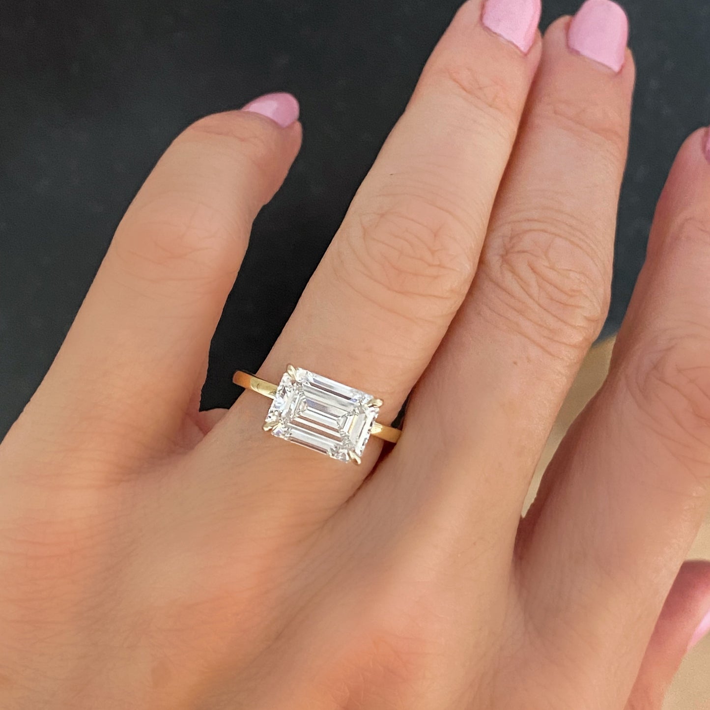 East West Emerald Cut Diamond Solitaire