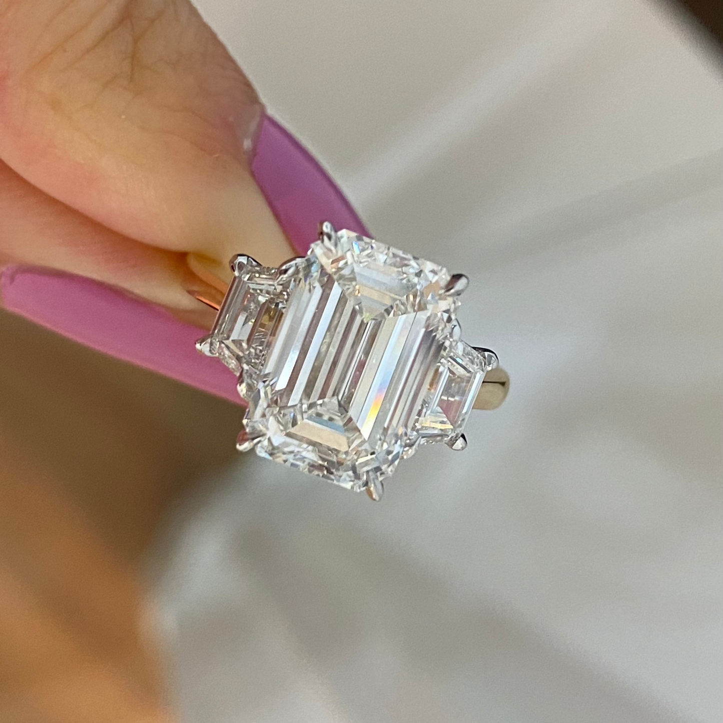 Emerald Cut with Trapezoid Diamonds Engagement Ring