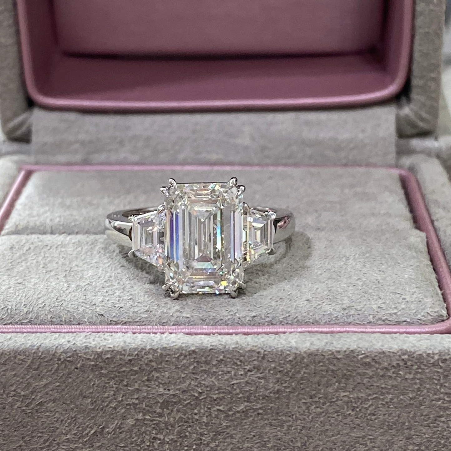 Emerald Cut with Trapezoid Diamonds Engagement Ring