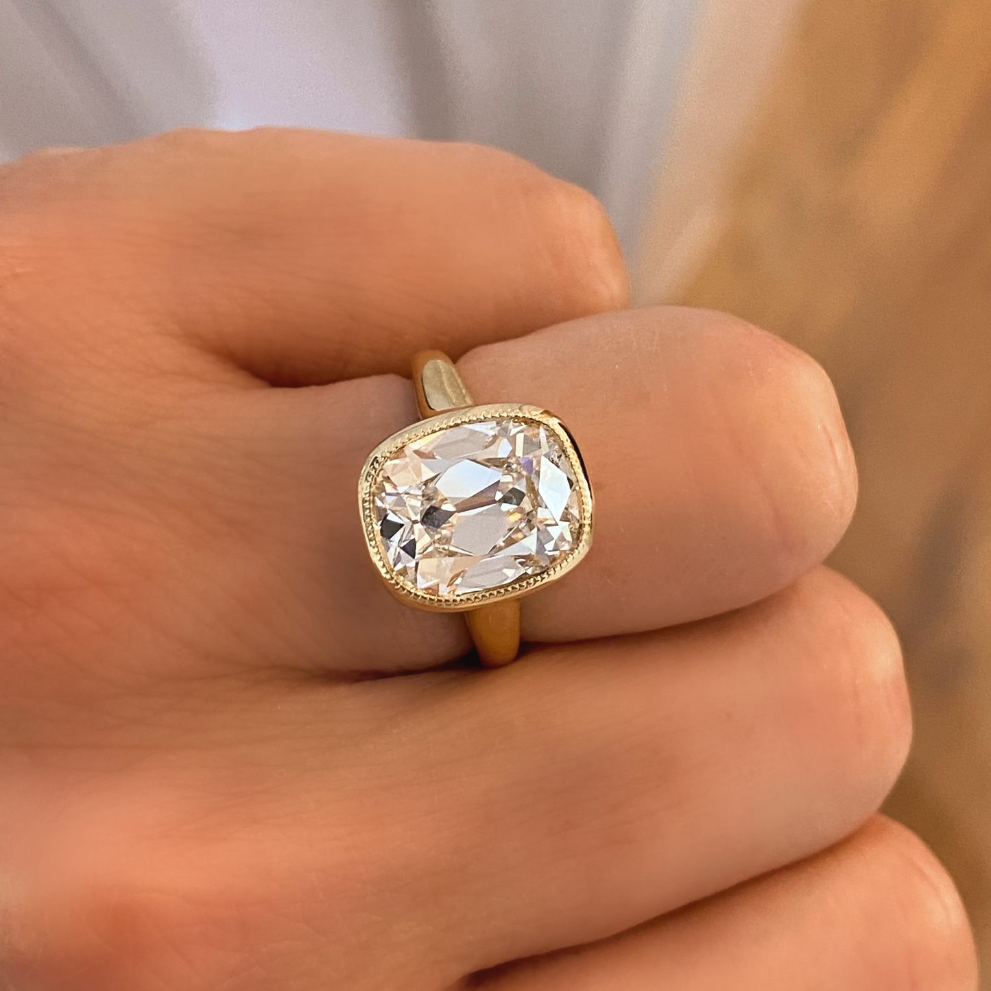 Antique Cushion Cut Yellow Gold Bezel Solitaire Ring