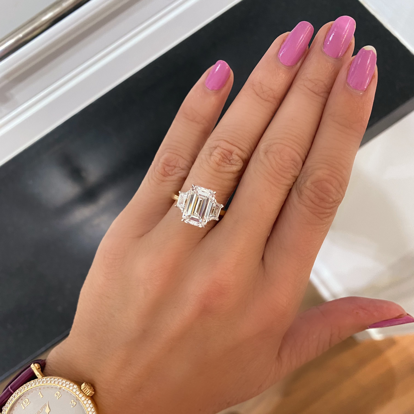 Emerald Cut with Trapezoid Diamonds Engagement Ring