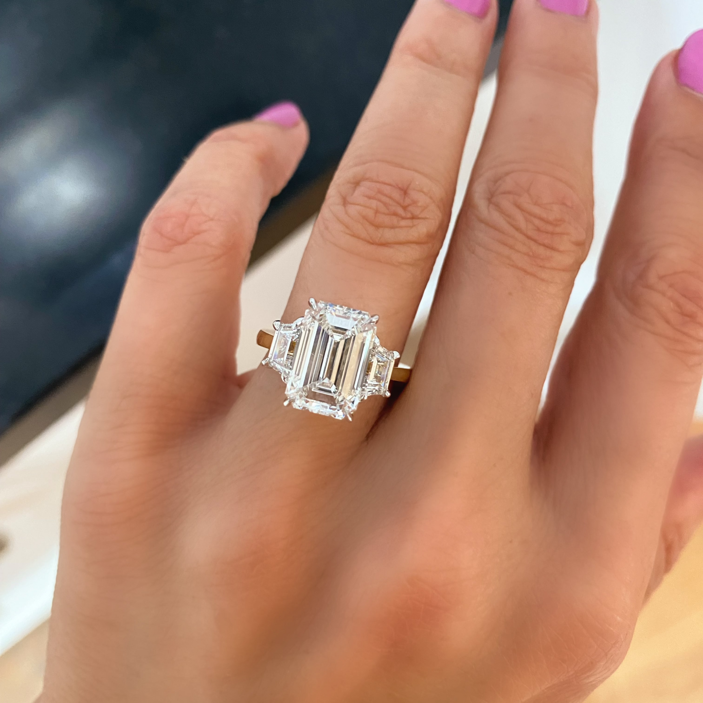 Emerald Cut with Trapezoid Diamonds Engagement Ring