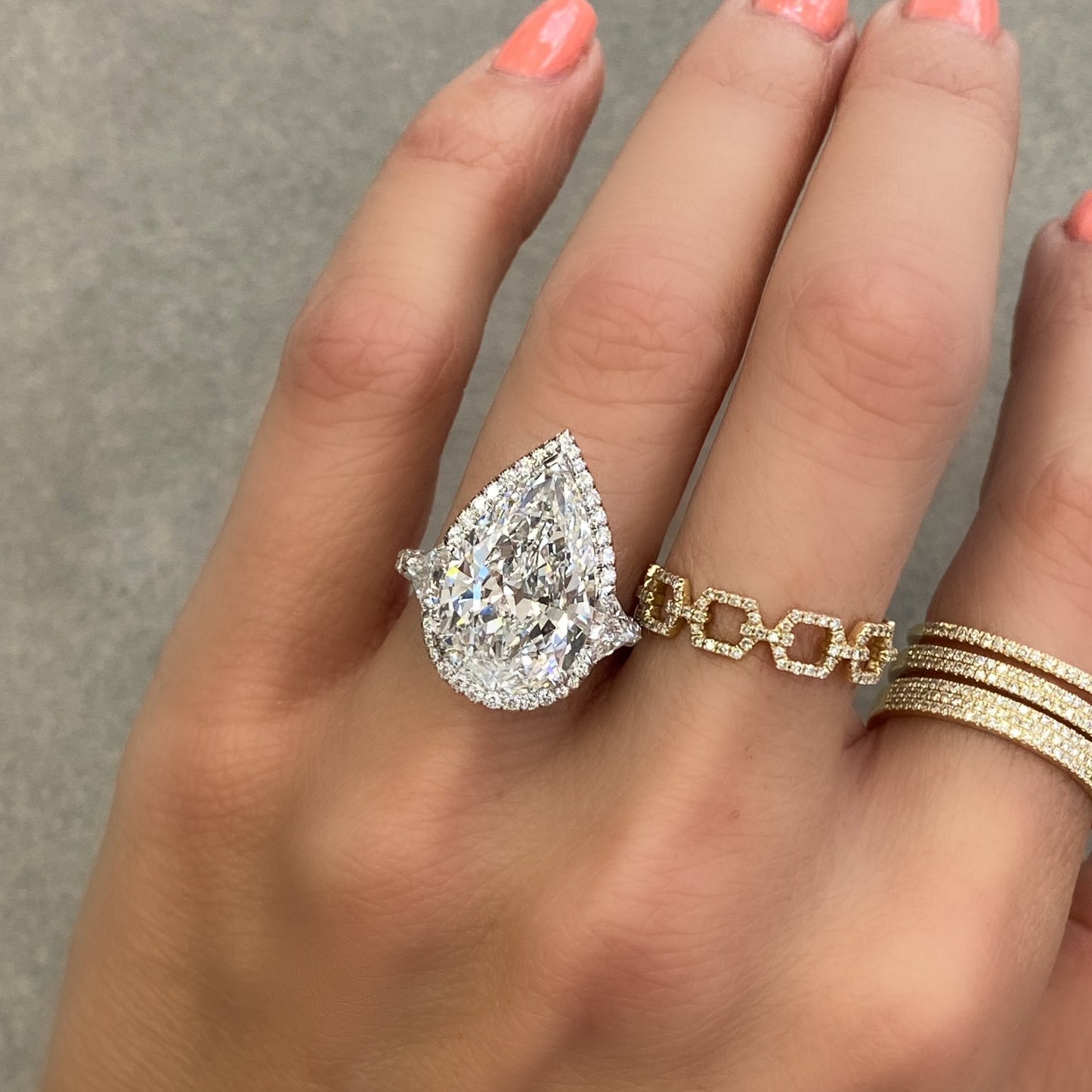 Bespoke Halo Pear 3 stone Engagement Ring