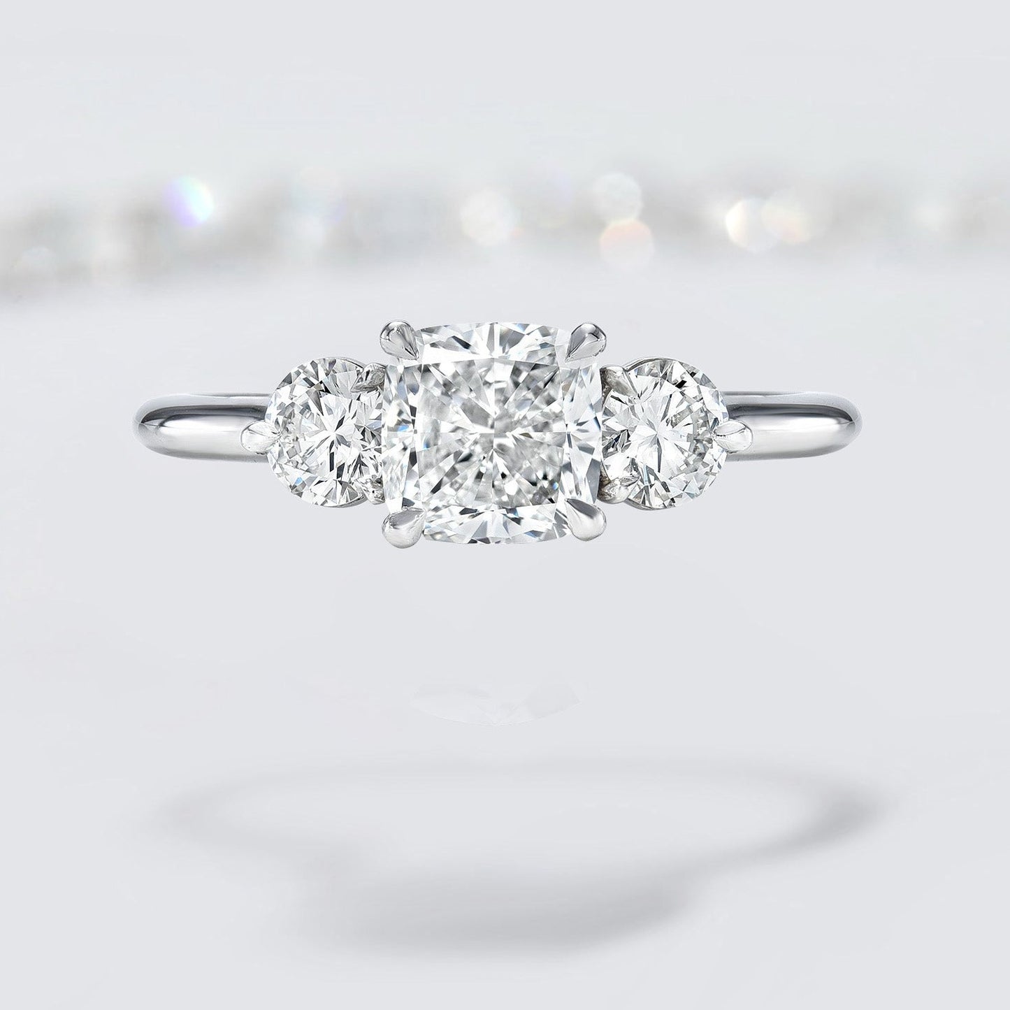 Cushion and Round Three Stone Diamond Engagement Ring