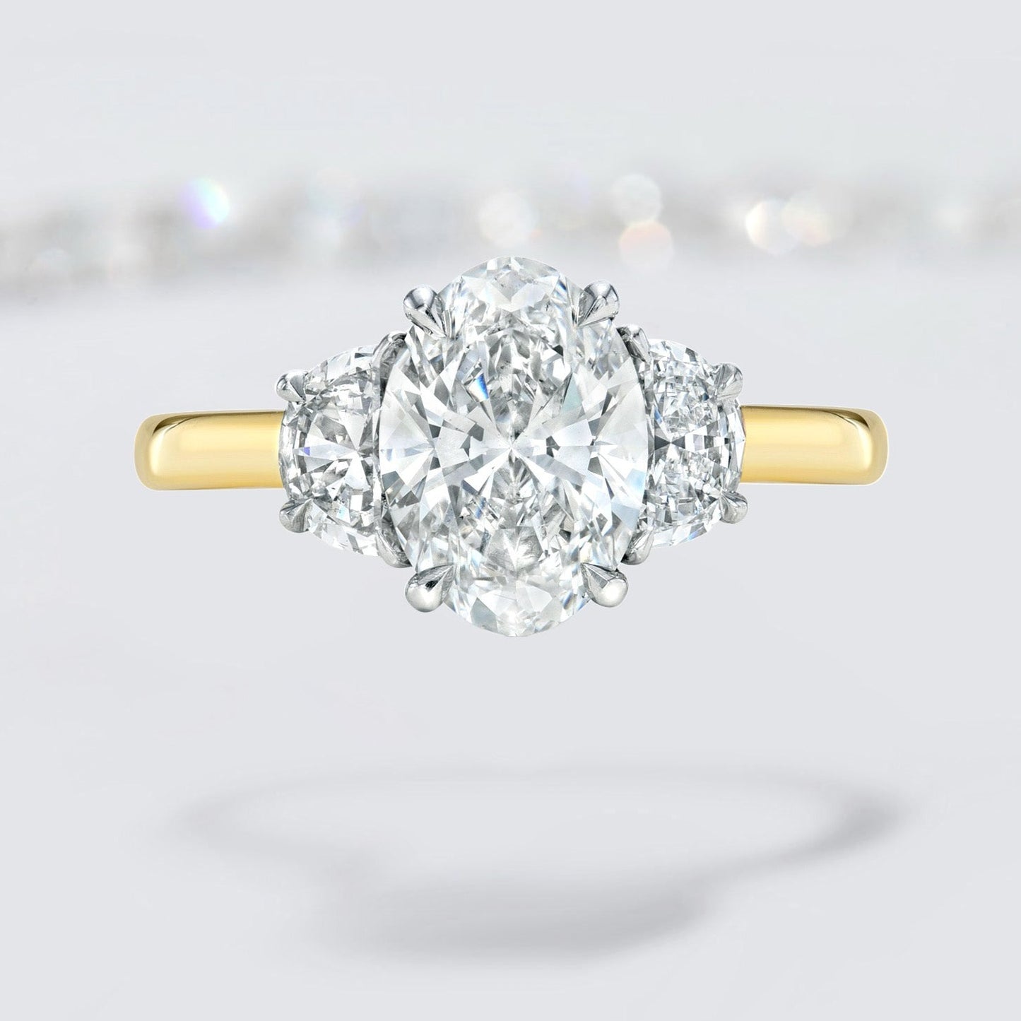Oval Cut Diamond Three Stone Engagement Ring with Half Moon Sides