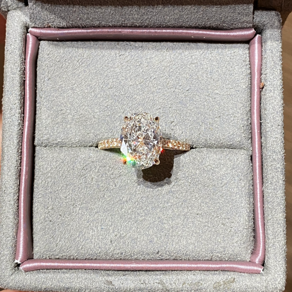 Oval Cut Diamond Engagement Ring with Pave Hidden Halo