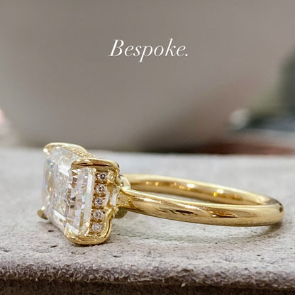 East West Emerald Cut Diamond Solitaire