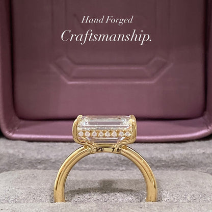 East West Emerald Cut Diamond Solitaire