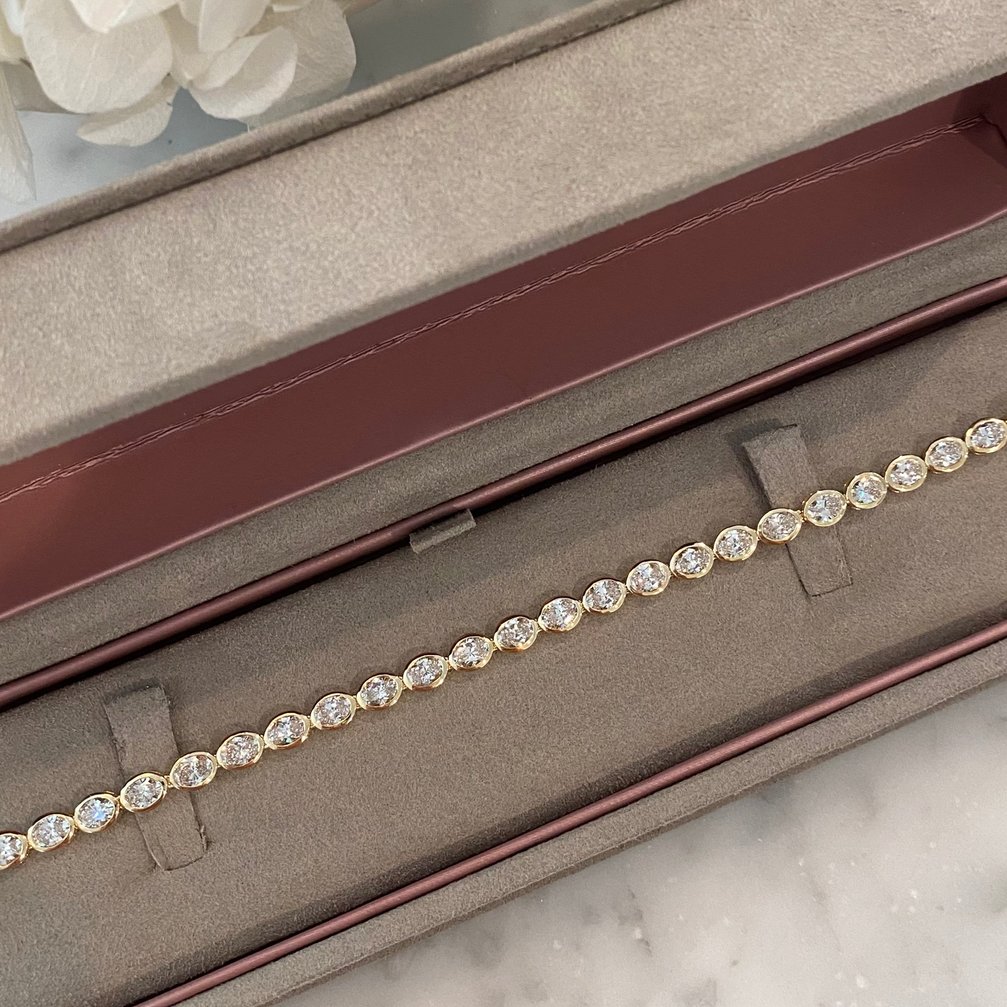 Oval East West Bezel Tennis Bracelet