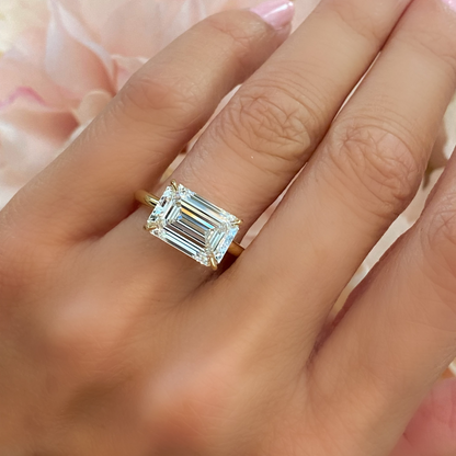 East West Emerald Cut Diamond Solitaire