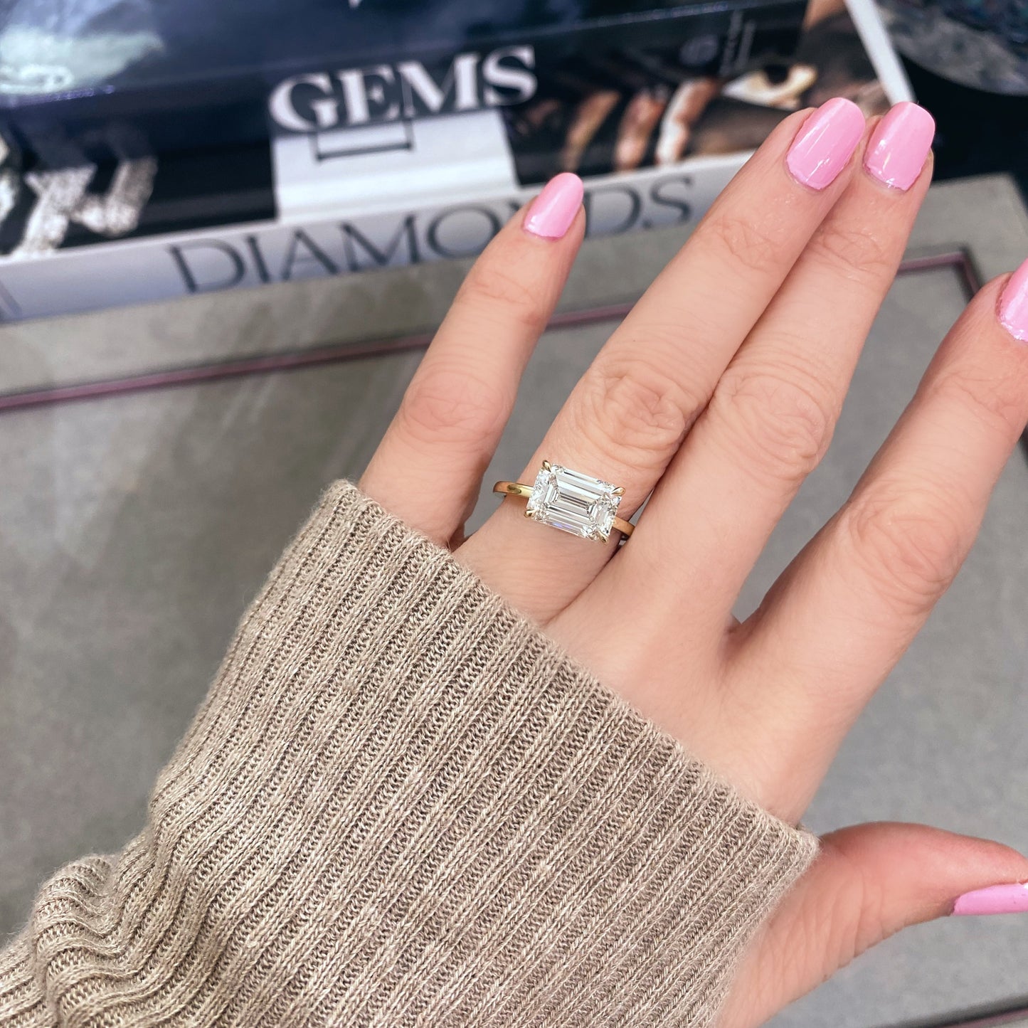 East West Emerald Cut Diamond Solitaire