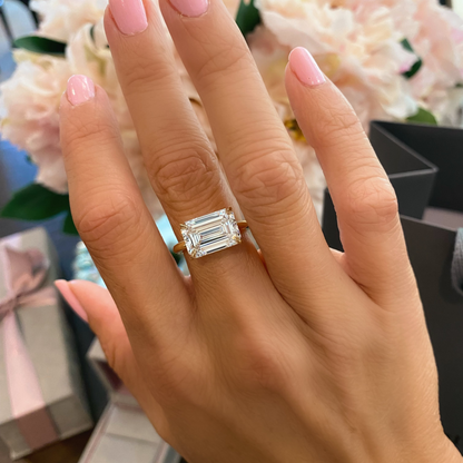 East West Emerald Cut Diamond Solitaire