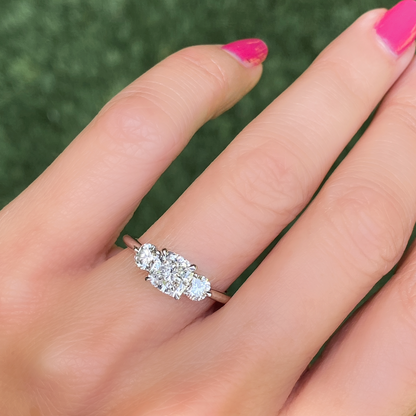 Three stone round brilliant engagement ring discount