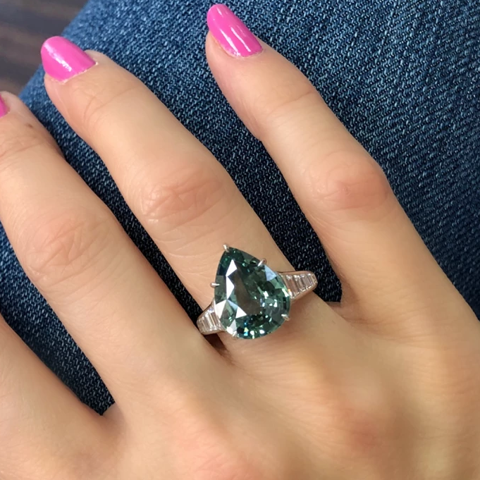 7 Ct. Pear Green Sapphire Ring with Trapezoid Diamonds