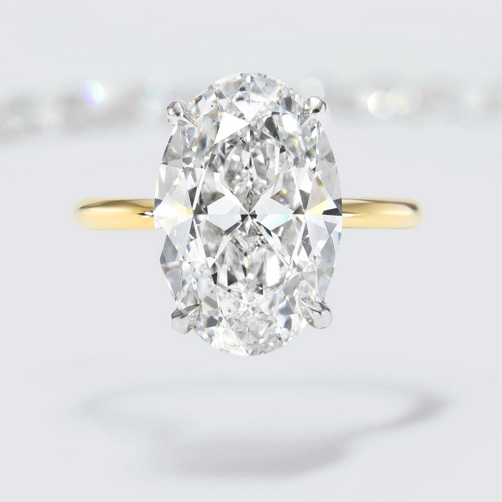 Antique Oval Cut Diamond Engagement Ring