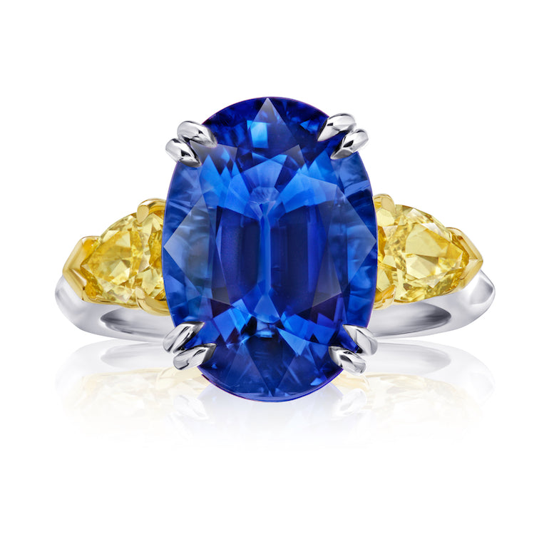 9 Ct. Three Stone Oval Blue Sapphire Ring with Yellow Diamonds